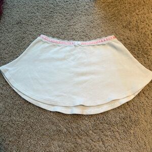 Finesse White mini skirt with lace and pink lining